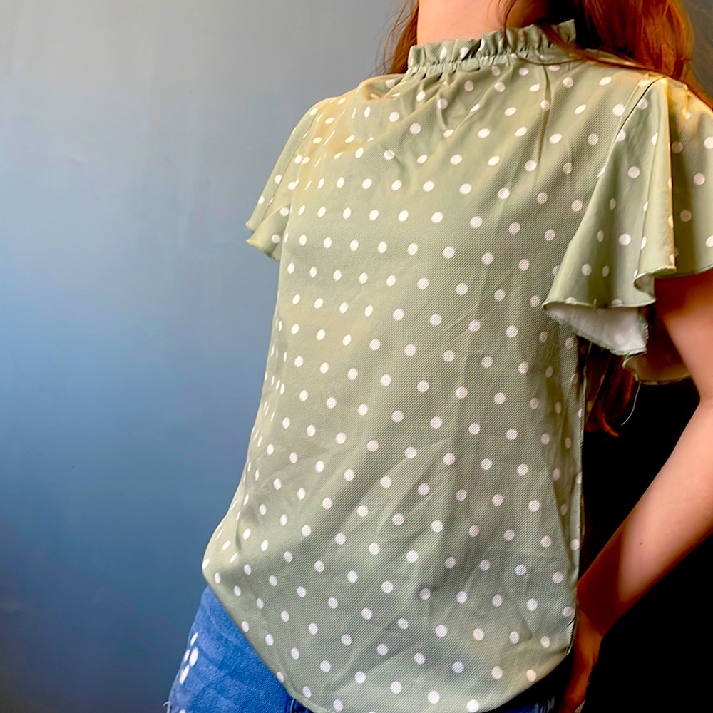 White blouse with white poke a dots